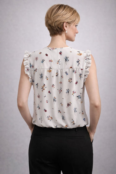 Eleganta ziedu blūze ar volāniem