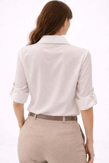 Eleganta balta blūze ar volāniem