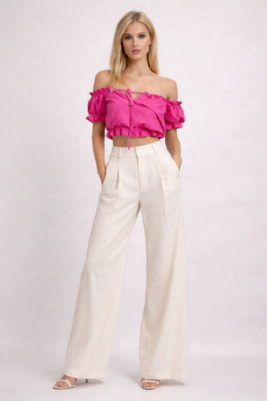 Atklātu plecu tops ar volāniem